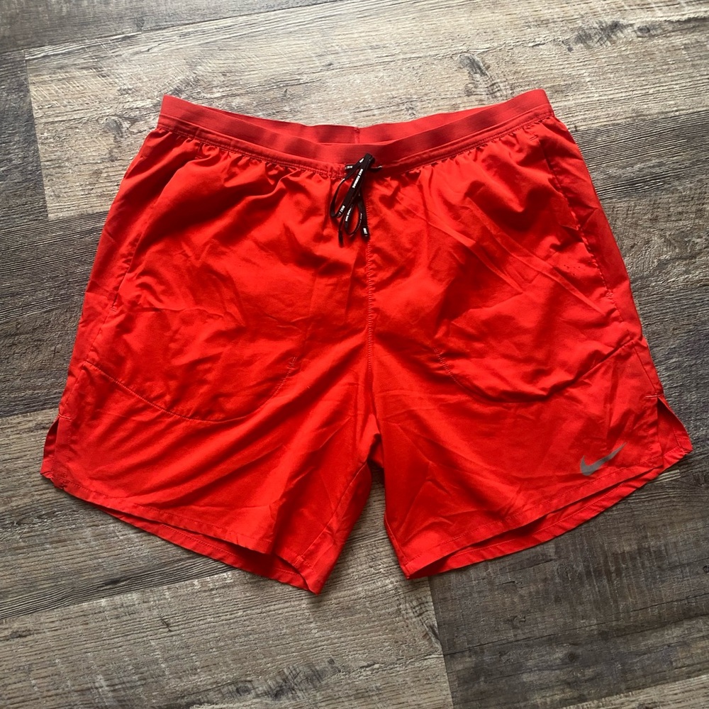 Nike Men's red running shirts with pockets